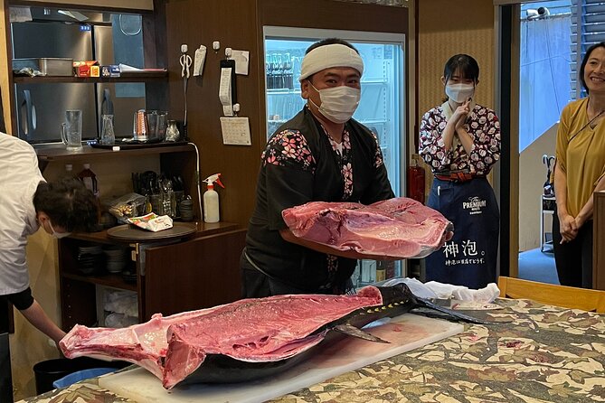 Tuna Cutting Show in Tokyo & Unlimited Sushi & Sake - Key Takeaways