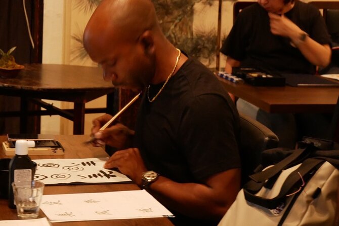 Japanese Calligraphy Experience in Tokyo at the Antique House - Maximum Travelers and Pricing