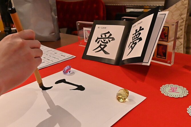 Learn Japanese Calligraphy With a Matcha Latte in Tokyo - Discover Traditional Paper Fan Art