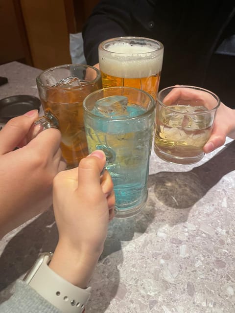 Japanese Style Pub Journey With Japanese University Students - Key Takeaways